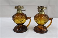 Pair of 7" amber glass finger oil lamps no shades