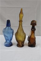 3 coloured glass decanters