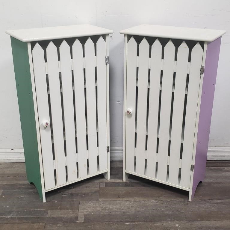 Pair of white picket fence multicolor cabinets