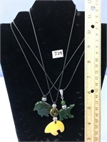 Lot with jade eagle necklace, jade bear necklace,