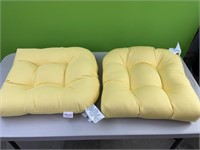 2 yellow subrella chair cushions - approx 17x18in