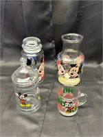 Four pieces of Mickey and Minnie, mouse glassware,