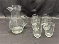 Glass, pitcher, and six glasses, with flower etchi