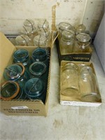4 boxes Mason jars with glass tops