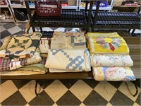 Stack of Old Quilts and Comforters