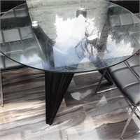 Glass table with black fingered base