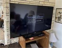 Samsung 55" smart TV and remote (Living Room)