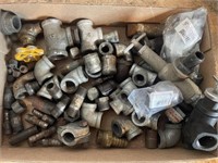 Assortment of threaded galvanized connectors. And