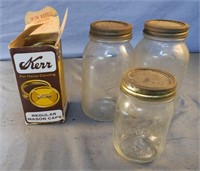 Kerr and Ball jars with rings and lids