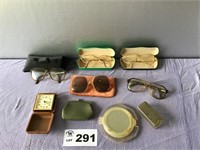 GLASSES, MAKE UP CASES AND ALARM CLOCK