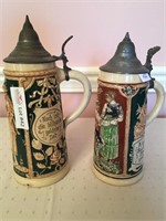 2 Unmatched stein, relief hand painted with