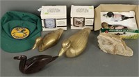 Group of duck related items including figures,