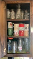 Kitchen cabinet contents- coffee mugs,