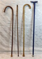 4 walking sticks/canes