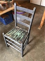 Black ladder back chair
