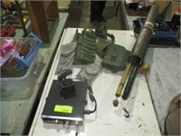 CB radio, fishing rod case, ammo pouches