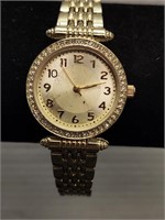 Vintage woman's watch. Adjustable band. Face
