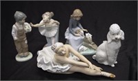 Four various Nao figurines