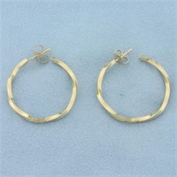 Twisting Hoop Earrings in 14k Yellow Gold