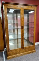 48" W x 76" T x 24" D Lighted oak display cabinet