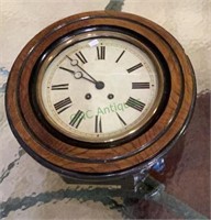 Antique hanging wind up clock with pendulum and