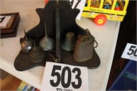 Oil Cans and Cowbell with Wooden Shelf