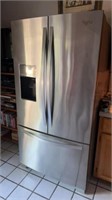 Whirlpool side by side refrigerator freezer,