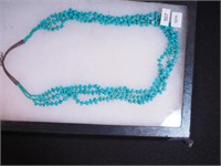 Three-strand turquoise beaded necklace