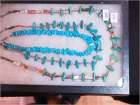 Three beaded necklaces, one is turquoise and