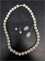 Ivory beaded necklace with threaded clasp 24" and