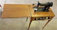 Vintage Singer Sewing Machine in Wooden Cabinet