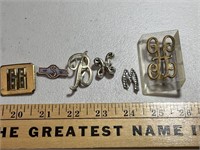 6 initial brooches