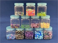 Plastic storage jars with assorted beads