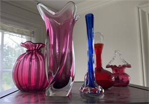 Five pieces of colored glass vases