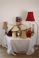 GROUP OF LAMP SHADES AND SEVERAL LAMPS