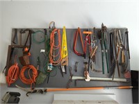 CONTENTS OF PEG BOARD AT FRONT OF GARAGE