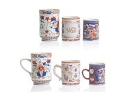 THREE CHINESE EXPORT FAMILLE ROSE PORCELAIN MUGS