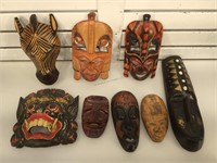 Carved wood tribal wall masks