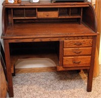 Oak rolltop desk and bow back Windsor chair