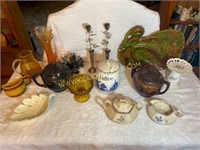 Assorted teapots and trinkets