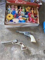 Cap Guns & Old Dolls