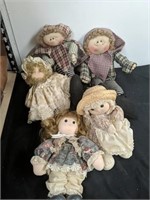 Large group of plush dolls