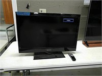 32 inch magnavox flat screen TV with base.