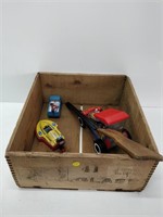 whiskey crate w/ toys - mini Tonka truck, etc.