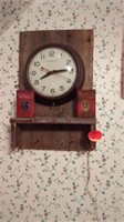 NEAT CLOCK ON A PIECE OF WOOD WITH 2 OLD TINS