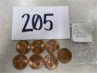 Lot of 7 British uncirculated pennies