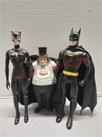 Batman, cat woman, and the penguin action figures