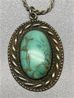 Unsigned sterling silver pendant set w/ turquoise