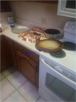 Baking molds, pizza stone, bundt pan and deep