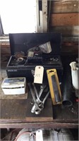 Stack-on metal toolbox with contents, wrenches,